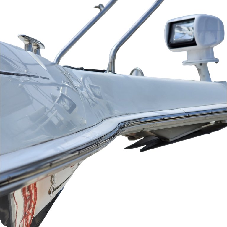 Polished hull and chrome rail after a wash and maintenance visit